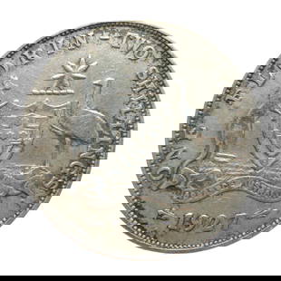 1927 Florin, King George V, .925 silver, Australia: This 1927 Australian Florin is a standard silver circulation coin issued under King George V, struck in sterling silver (.925). The obverse features the crowned bust of George V facing left, designed
