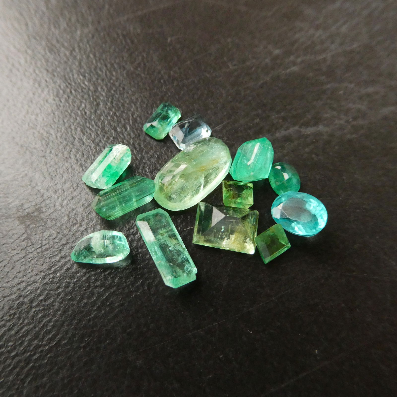 8.8 ct Natural Untreated Emerald Parcel, Mixed Cuts, Panjshir, Afghanistan: A rare and highly desirable parcel totaling 8.8 carats of natural, untreated emeralds from the renowned Panjshir Valley in Afghanistan, a source celebrated for producing some of the world’s most vib