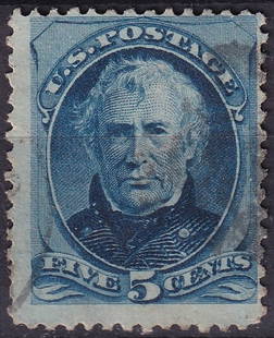 1875 USA 5 Cents Blue Zachary Taylor Stamp with Rare J Grill Variant Scott US 179c: This exceptional 5 cents postage stamp from the United States, issued on July 15, 1875, features a finely engraved portrait of President Zachary Taylor in a striking blue hue. Produced by the Continen