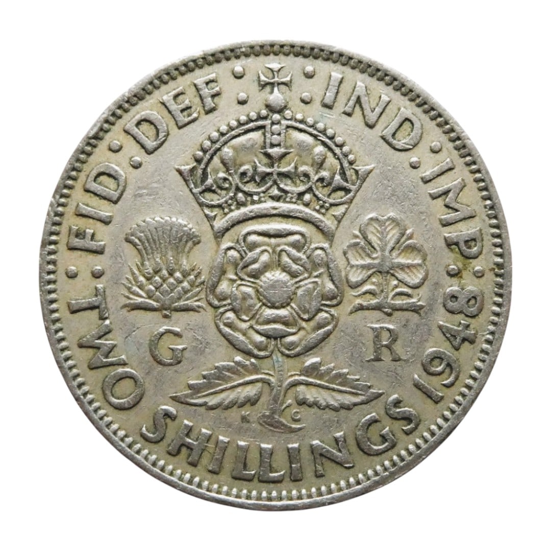 1948 UK Two Shillings, George VI, Floral Emblems, KM# 865: This British two shillings coin (also known as a florin) from 1948 features an intricate floral design symbolizing the unity of the United Kingdom. The crowned Tudor rose at the center is flanked by a