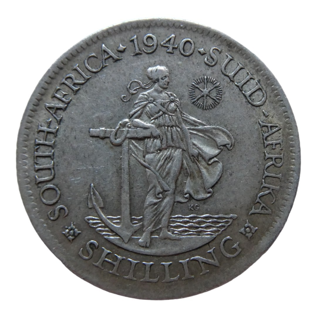 1940 South Africa 1 Shilling, King George VI, .800 Silver: This is a 1940 South African 1 Shilling coin issued under the reign of King George VI, part of the standard circulation series minted between 1937 and 1947. Catalogued as N#9859, this silver coin repr