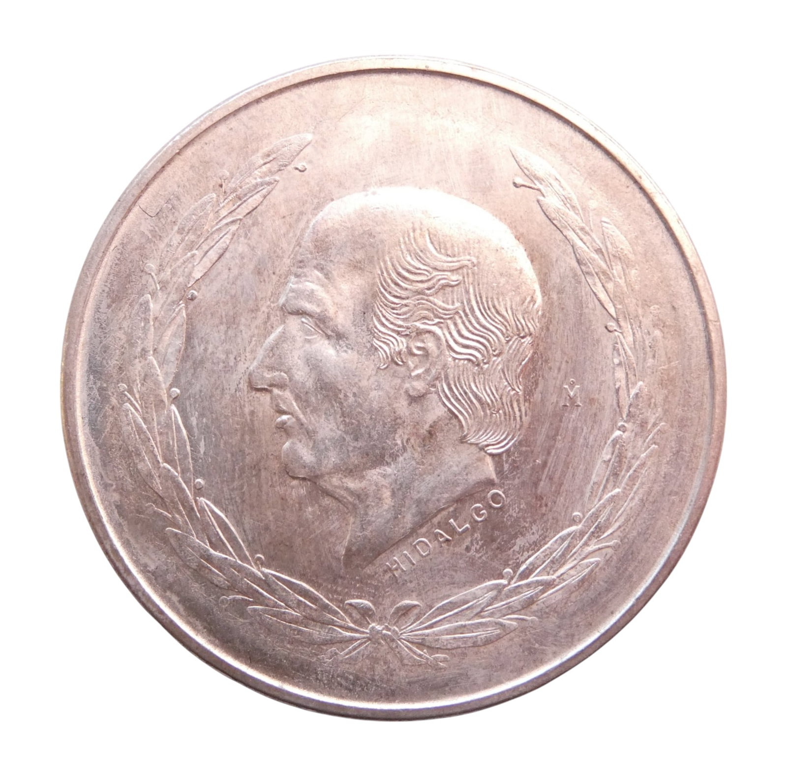 1952 Mexico 5 Pesos, silver coin, eagle & serpent, 0.720 fineness: This impressive 5 pesos silver coin from Mexico was minted in 1952 during the era of the United Mexican States. Composed of 72% silver and weighing 27.78 grams, the coin boasts a substantial 40 mm dia