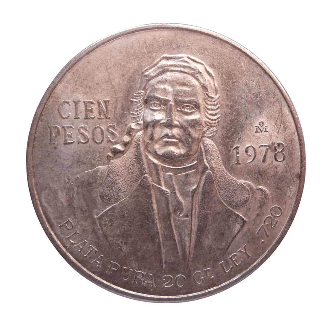 1978 Mexico 100 Pesos Silver Coin, Miguel Hidalgo Portrait: This 100 pesos silver coin from Mexico, dated 1978, is part of the circulating coinage issued between 1977 and 1979 under the United Mexican States. It features a prominent portrait of Miguel Hidalgo 