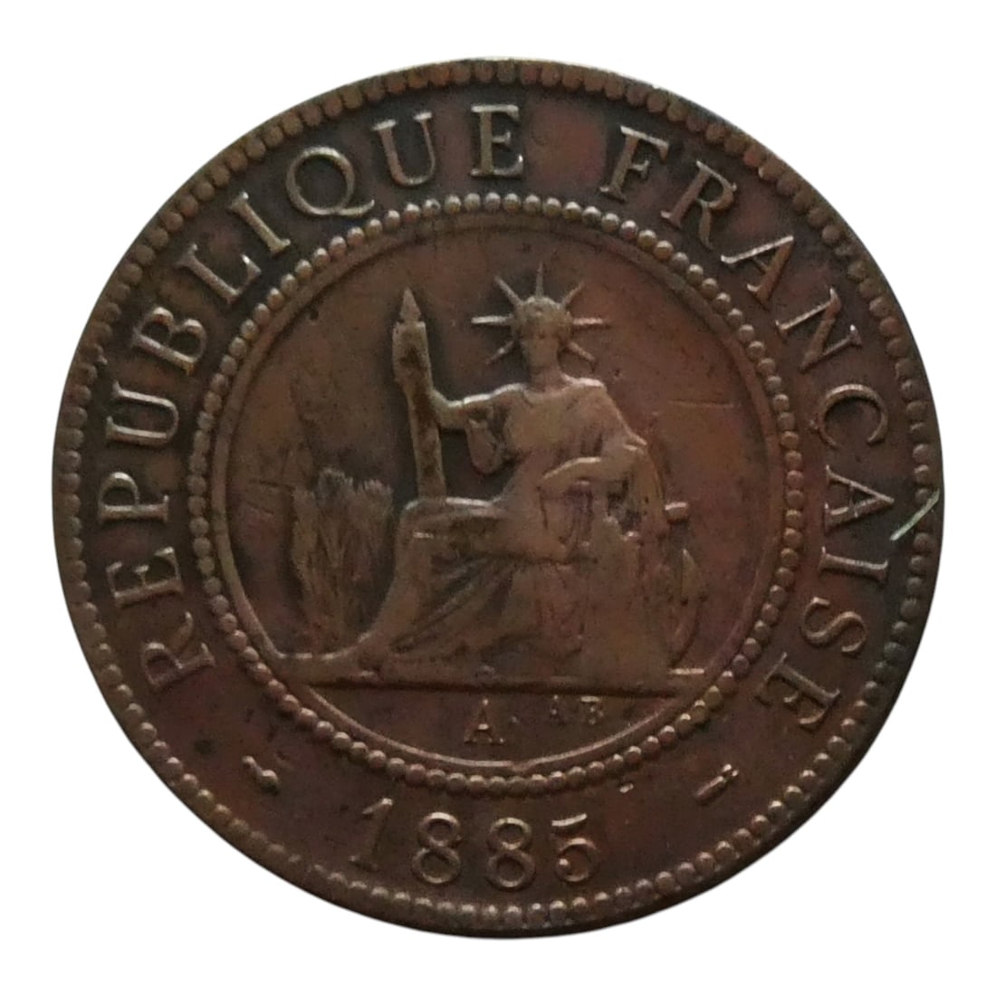 French Indochina 1885 1 Cent Bronze Coin, Paris Mint: Issued under the French colonial administration in Indochina, this bronze 1 Cent coin dated 1885 represents one of the most iconic early colonial series struck at the Paris Mint. The obverse features