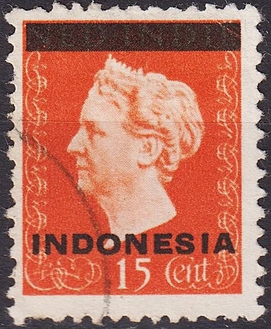 1948 Dutch Indonesia Overprint on Netherlands Queen Wilhelmina, Scott NL-IN 294a: Issued on December 31, 1948, this historically significant 15 cent orange stamp originates from the Netherlands Queen Wilhelmina definitive series and was overprinted “INDONESIA” following the