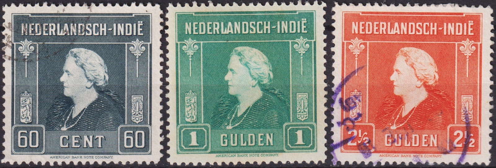 1945 Netherlands Indies “Liberation?? Queen Wilhelmina Set Scott 260–262 Complete: Complete set of 1945 Netherlands Indies “Liberation Issue”, featuring the engraved portrait of Queen Wilhelmina designed by E. Dawson and J.B. Romein, printed by the American Bank Note Company