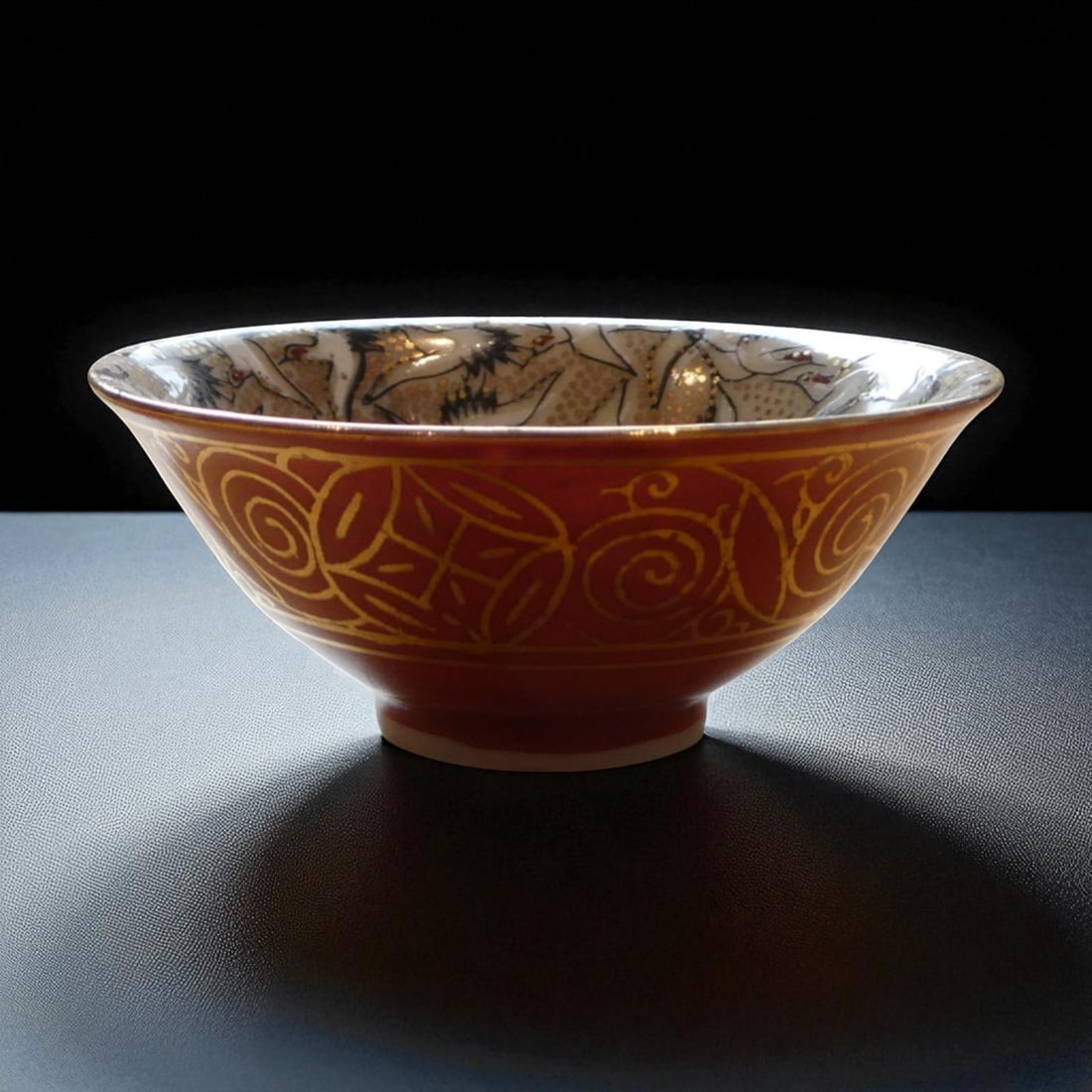 Japanese Sake Bowl with Gilded Swirl Motif, Showa Period, ca. 1950s: This elegant Japanese sake bowl dates to the mid-20th century, likely the 1950s, and exemplifies the fusion of traditional craftsmanship and decorative aesthetics characteristic of the Showa period. M
