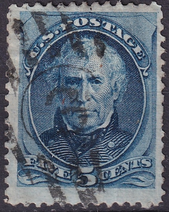 1879 United States Zachary Taylor Scott 185 used: This five cent definitive from the 1879 American Bank Note Company issue shows the engraved portrait of General and President Zachary Taylor in a deep blue tone exhibiting the refined line work and in