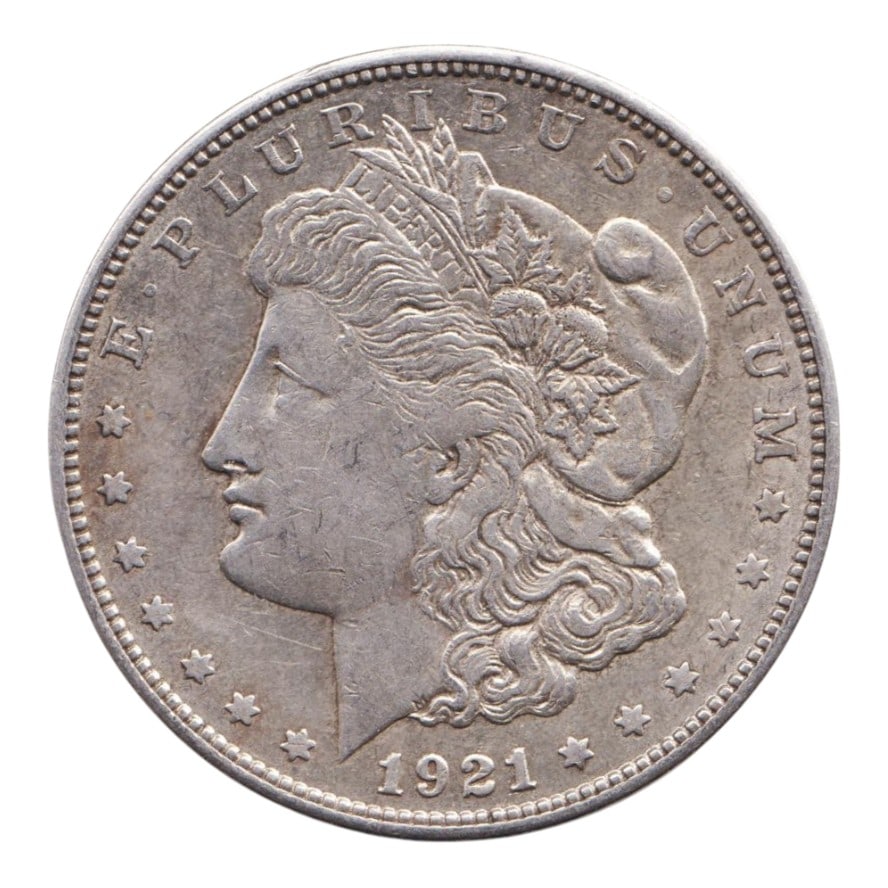 US 1921-S Morgan Silver Dollar, 90% Silver, Near Uncirculated Example: The Morgan Dollar, named after its designer George T. Morgan, is one of the most iconic coins in American numismatic history. Struck between 1878 and 1921, it embodies the economic optimism of post-Ci
