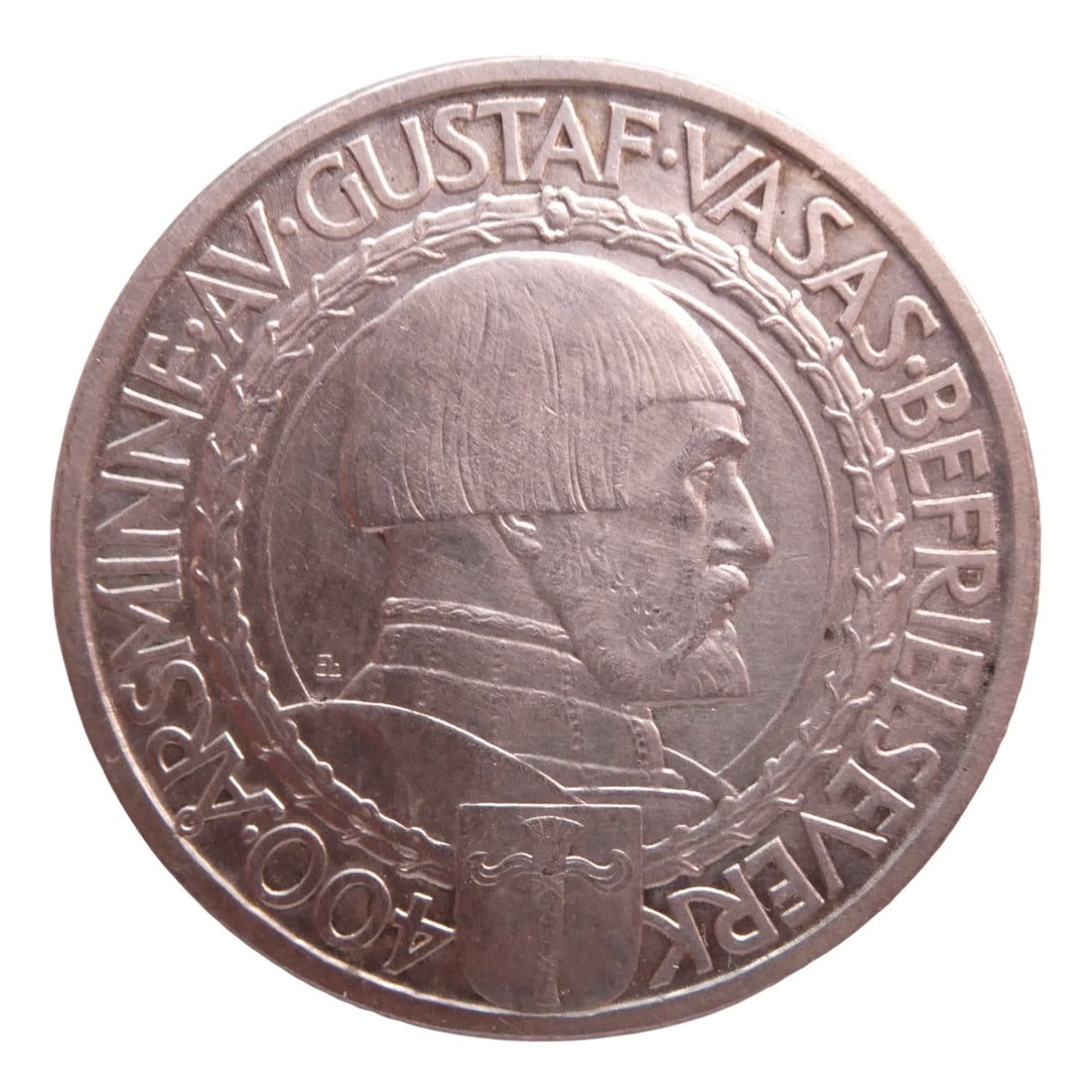 1921 Sweden 2 Kronor, Gustaf Vasa Jubilee, Silver Commemorative: Struck in 1921 to commemorate the 400th anniversary of Sweden's liberation from Danish rule and the rise of Gustaf Vasa, this 2 Kronor silver coin stands as one of the most historically resonant piece