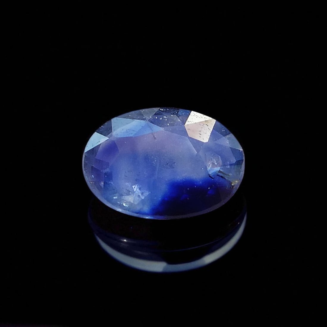 Fine 0.75 ct Deep Blue Natural Sri Lankan Sapphire, Oval Mixed Cut, ALGT Certified: This exquisite 0.75-carat natural sapphire exemplifies the rich gemological heritage of Sri Lanka, historically known as Ceylon and renowned for producing some of the world’s most prized blue sapphi