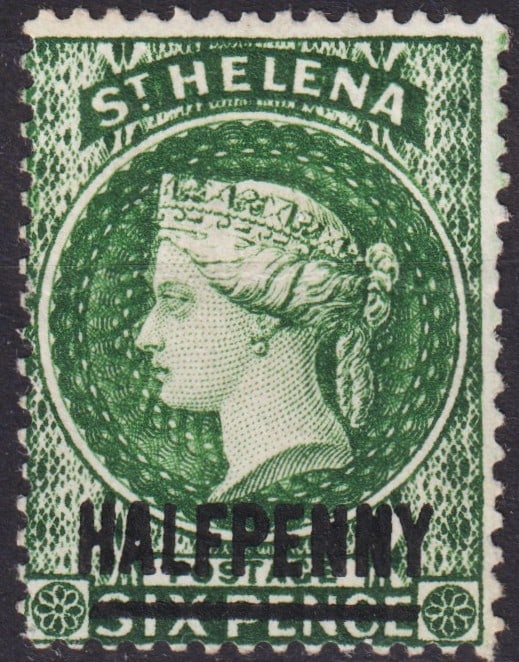 St. Helena 1885 Queen Victoria Halfpenny on Sixpence, Scott #34: This scarce colonial issue from St. Helena, released in 1885, features the overprinted surcharge "HALFPENNY" on the original green Sixpence definitive portraying Queen Victoria in left profile, printe