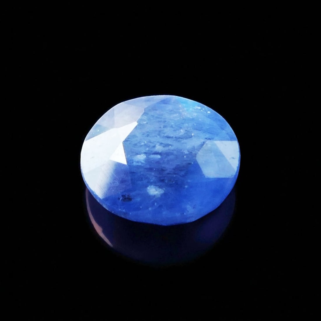 1.15 ct Heated Blue Sapphire, Oval Mixed Cut, ALGT Certified: This 1.15 carat natural blue sapphire, certified by the Antwerp Laboratory for Gemstone Testing (ALGT Report No. 82771797, dated 31 August 2023), features an elegant oval mixed cut that balances brill
