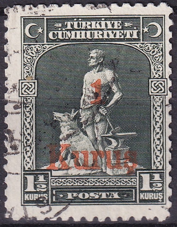 1931 Turkey Blacksmith and Wolf 1 Kurus Red Surcharge on ½ Kuru? Scott 727 Michel TR 935: Issued in 1931 by the Republic of Turkey, this striking 1 Kuru? red surcharge on the ½ Kuru? black green definitive belongs to the celebrated “Blacksmith” series, designed by Ali Sami B