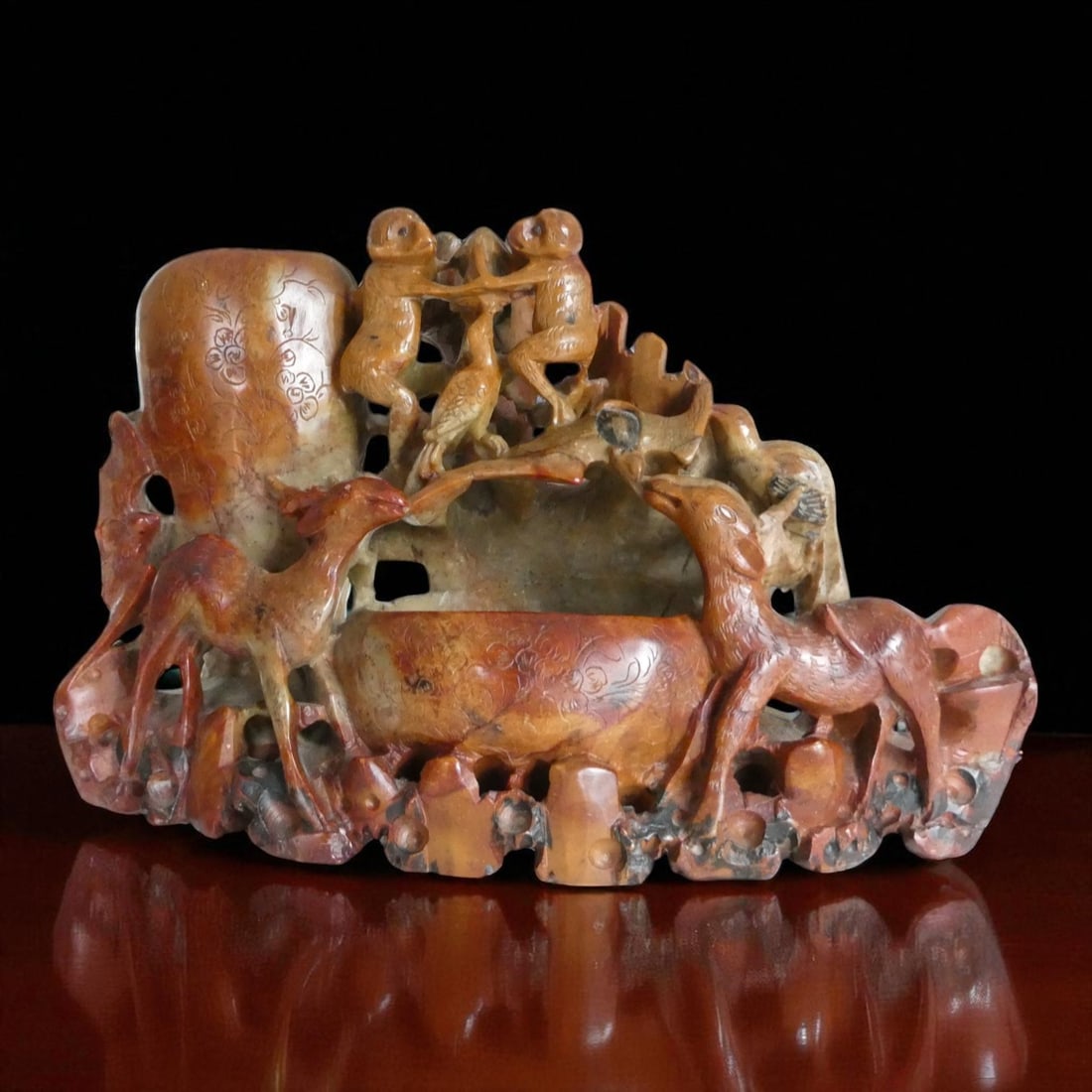 Chinese Carved Soapstone Brush Washer Group with Monkeys and Deer, c. 1900: A richly hand-carved Chinese soapstone brush washer group, dating to the late Qing dynasty or early Republic period (circa 1880–1920), measuring 26 cm wide, 17 cm high, and 10 cm deep, with a substa
