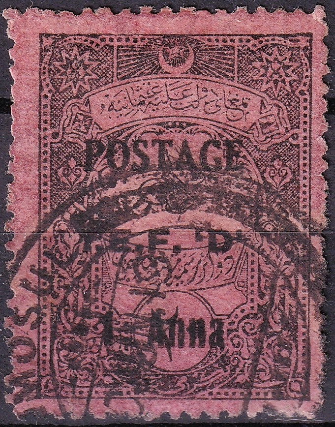 Iraq Mosul British Occupation 1919 Scott N43 1 anna: This scarce 1 anna provisional from the British occupation of Mosul in 1919 was created by taking an Ottoman revenue design with the large tughra and applying a bold horizontal POSTAGE and IEF D surch