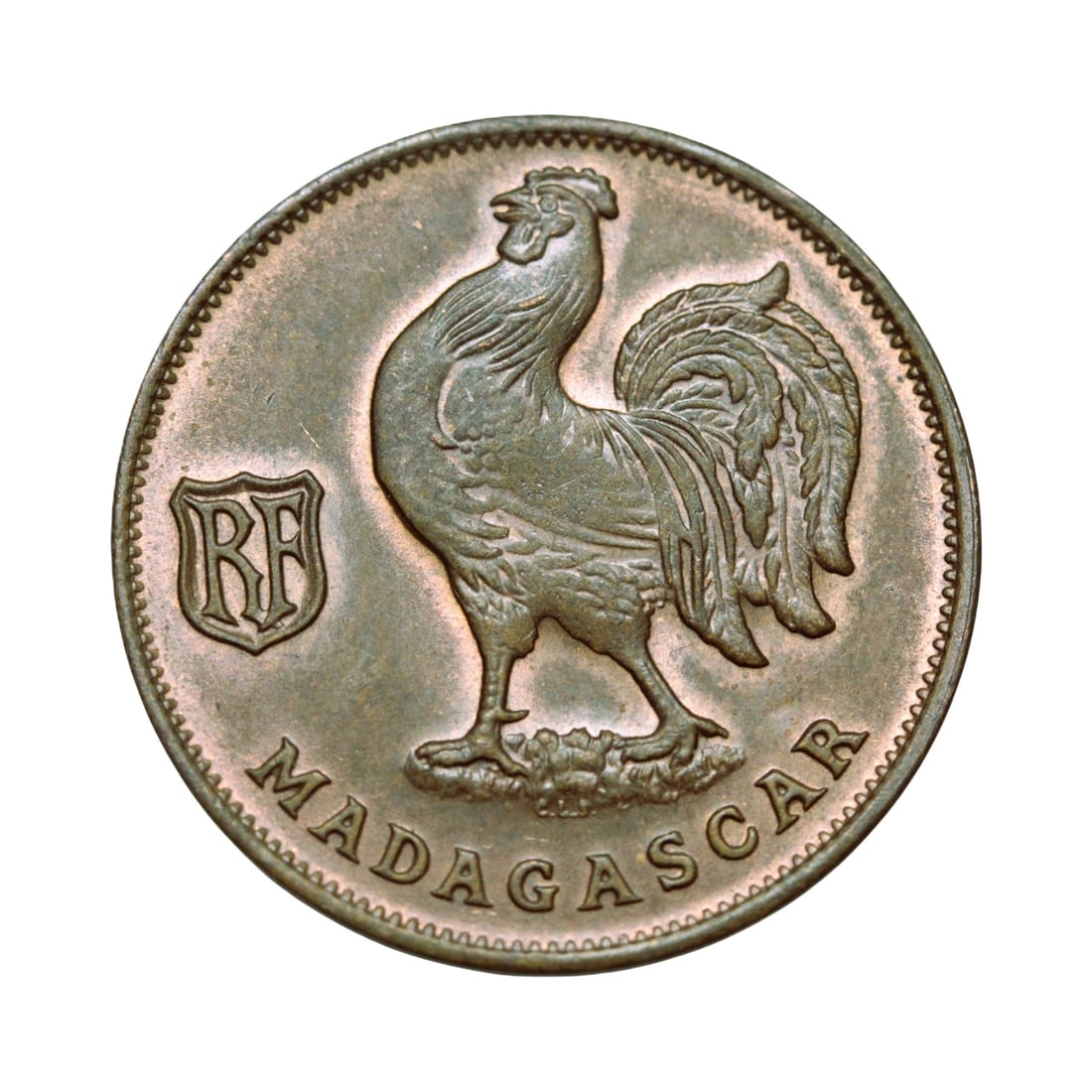 Madagascar French colonial 1 Franc 1943 bronze rooster issue: This attractive bronze 1 Franc dated 1943 was struck for Madagascar during the period of French colonial administration and represents both wartime necessity and symbolic national imagery. The obverse