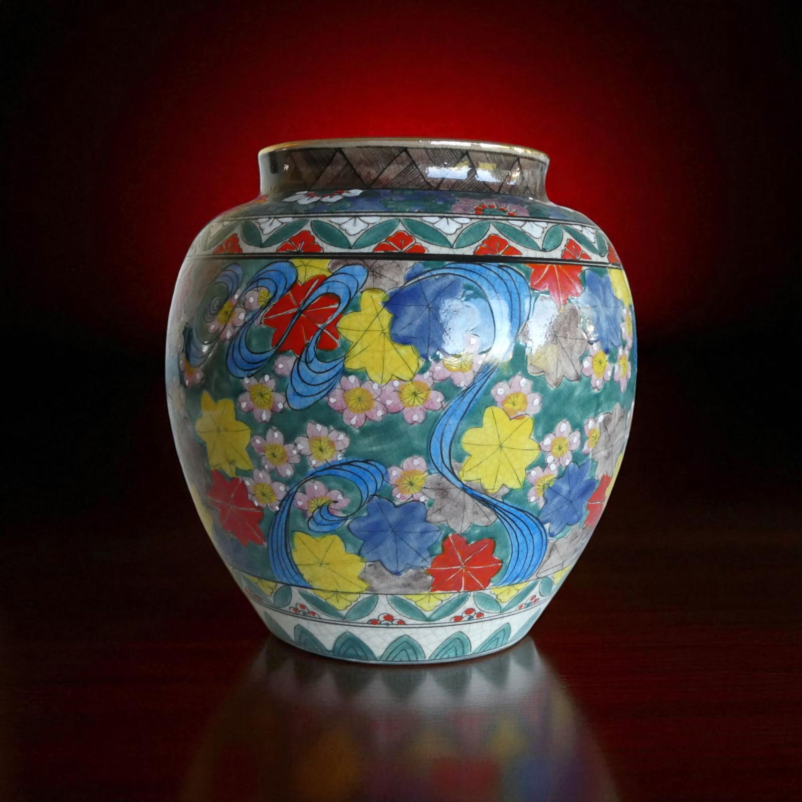 Japanese Export Jar, Hand-Painted Floral Motifs, Early 20th Century: This vibrant Japanese export porcelain jar, dating from the early 20th century, is a fine example of hand-painted decorative ware produced for international markets. Measuring 18.5 cm in height and 17
