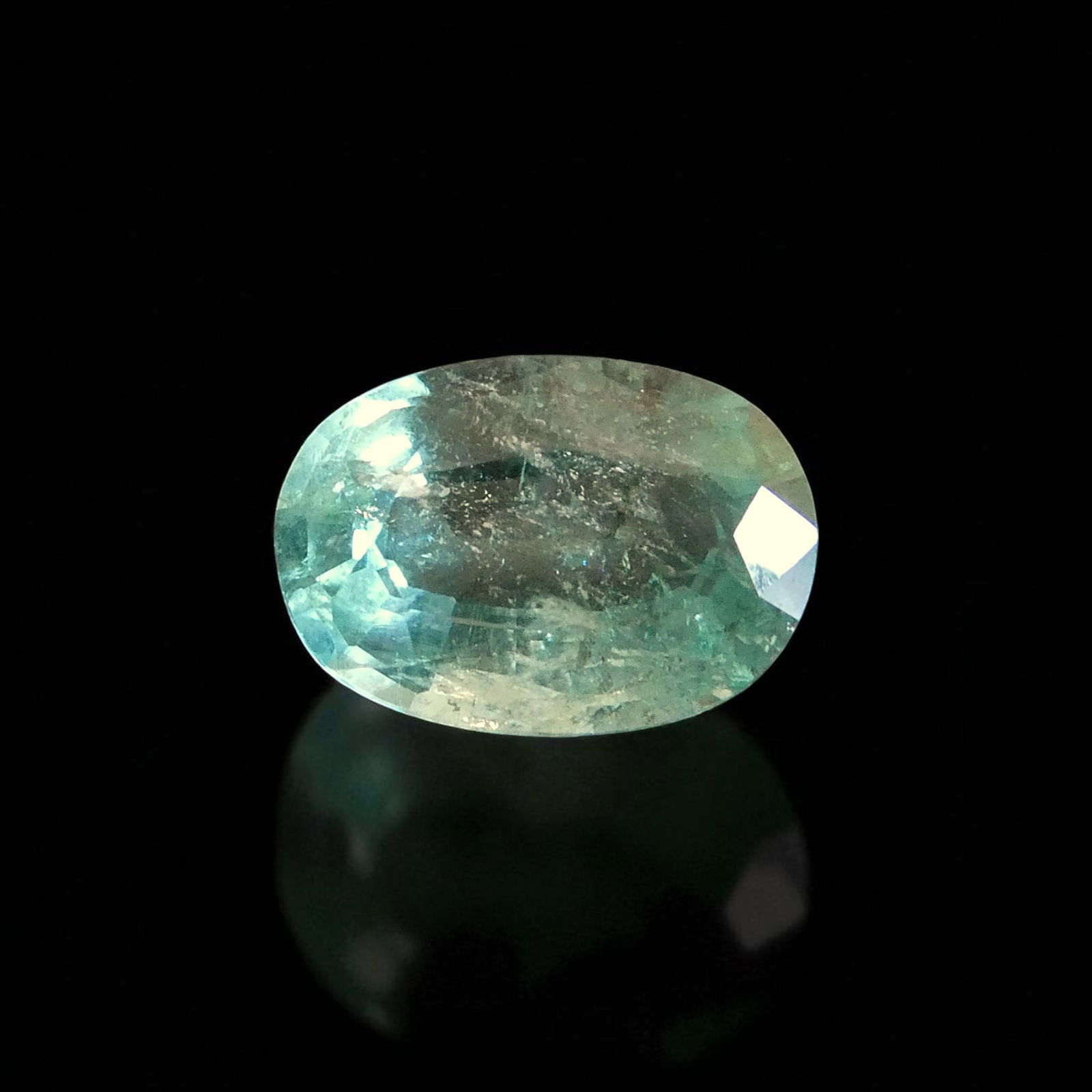 3.75 ct Natural Untreated Lime Green Emerald, Panjshir Afghanistan: This striking 3.75-carat lime green emerald originates from the renowned Panjshir Valley in Afghanistan, a region celebrated for producing emeralds of exceptional transparency and vivid color. Cut in
