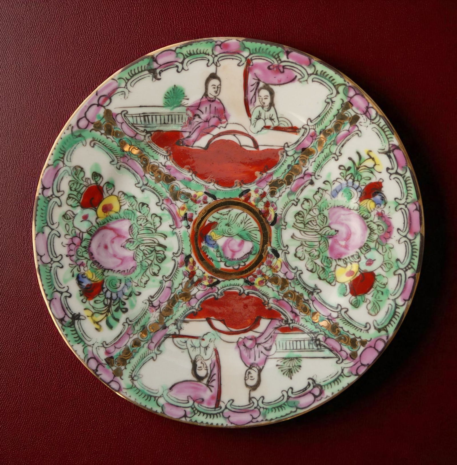 Macau Rose Medallion Porcelain Plate Qianlong Mark 1950s Hand Painted: This Macau rose medallion porcelain plate dating to the mid twentieth century is a finely hand painted example of the vibrant famille rose tradition produced in Macau workshops during the 1950s when t