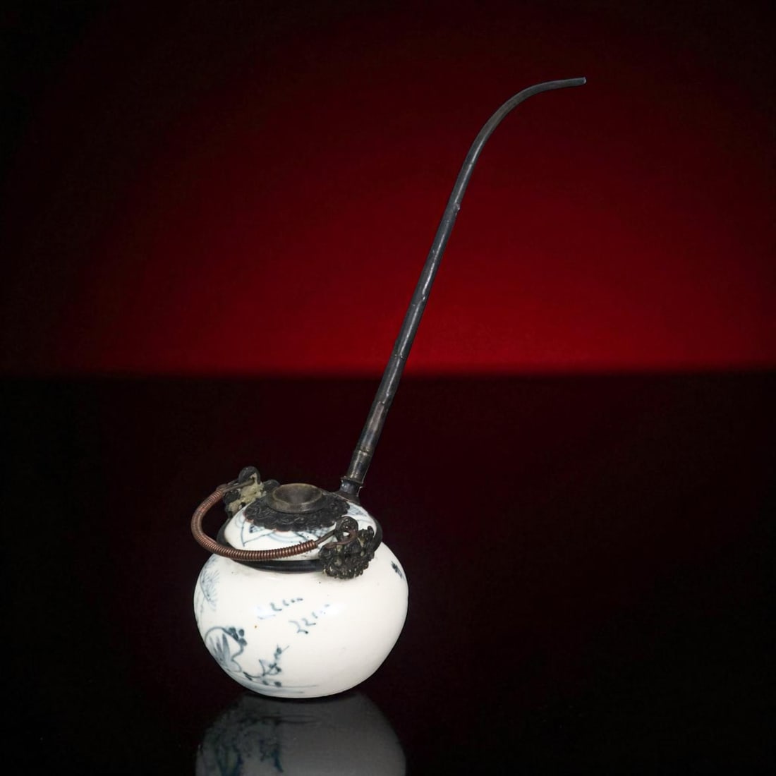 Chinese Qing Dynasty Blue and White Porcelain Opium Water Pot with Calligraphy and Bamboo Motif, 19t: An elegant 19th century Qing Dynasty blue and white porcelain opium water pot of compressed globular form, measuring 8 cm in height and weighing 262 grams, complete with its original long metal pipe a