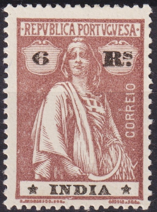 Portuguese India 1919 Ceres Issue 6R Brown Overprint, Michel 344yA / Scott 357G: This rare Portuguese India stamp belongs to the celebrated Ceres issue, released in 1919, showcasing the allegorical figure of Ceres, the Roman goddess of agriculture and fertility. Printed in light b