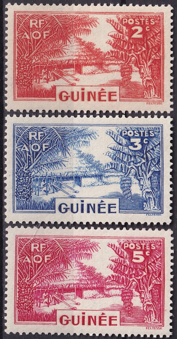 French Guinea 1938–1940 “Village Scene and Palm Trees?? Set (Scott FR-GU 128–130): Issued in 1938 under the French colonial administration of Afrique Occidentale Française (A.O.F.), this definitive series from French Guinea captures the idyllic tropical environment and agricultural