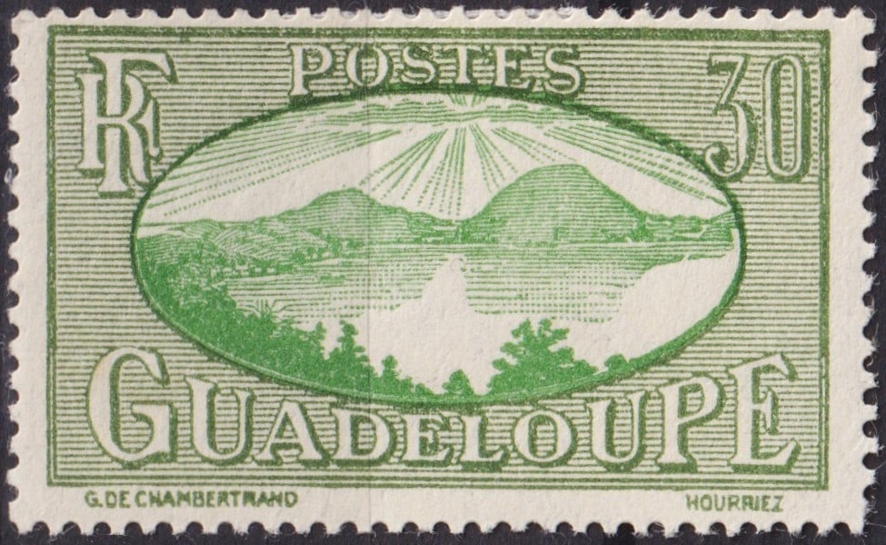 French 1928 Guadeloupe 30c Green Landscape, Scott 105: Issued on June 18, 1928, this 30 centimes definitive stamp from Guadeloupe belongs to the celebrated “Landscape” series, designed by Georges Hourriez and Gilbert de Chambertrand. Printed by ty
