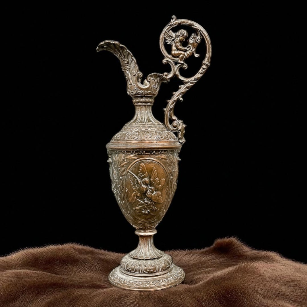 Late 19th Century Neo-Renaissance Ewer, Aluminum Bronze, 47 cm: This ornate neo-Renaissance ewer, standing at 47 cm in height, is cast in aluminum bronze and features exceptionally detailed decorative motifs typical of the late 19th century. The vessel's body is r