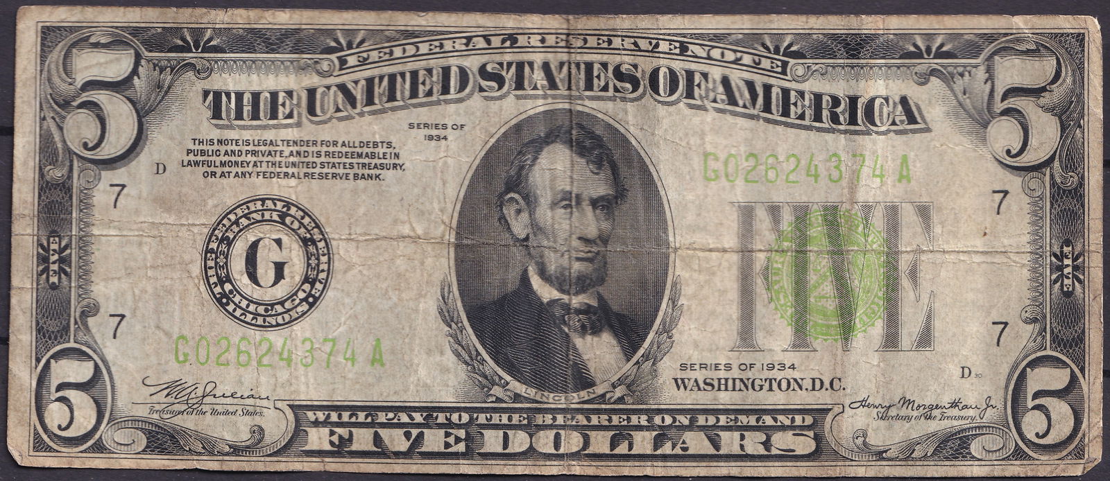 1934 United States $5 Federal Reserve Note – Lincoln Portrait, Chicago Issue: A classic $5 Federal Reserve Note from the Series of 1934, issued during the economic recovery of the Great Depression. Printed by the Bureau of Engraving and Printing in Washington, D.C., this note f