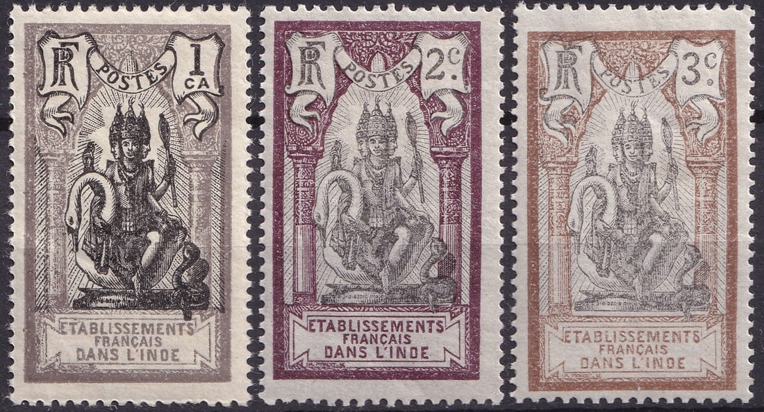 1914 French Brahma and Kali Temple, MNH set of 3 values, Michel FR-IN 25–27: This mint never hinged trio from the French India series "Brahma and Kali Temple" (1914–1922) features an imposing central figure inspired by Brahma seated on a swan, flanked by elaborate columns an
