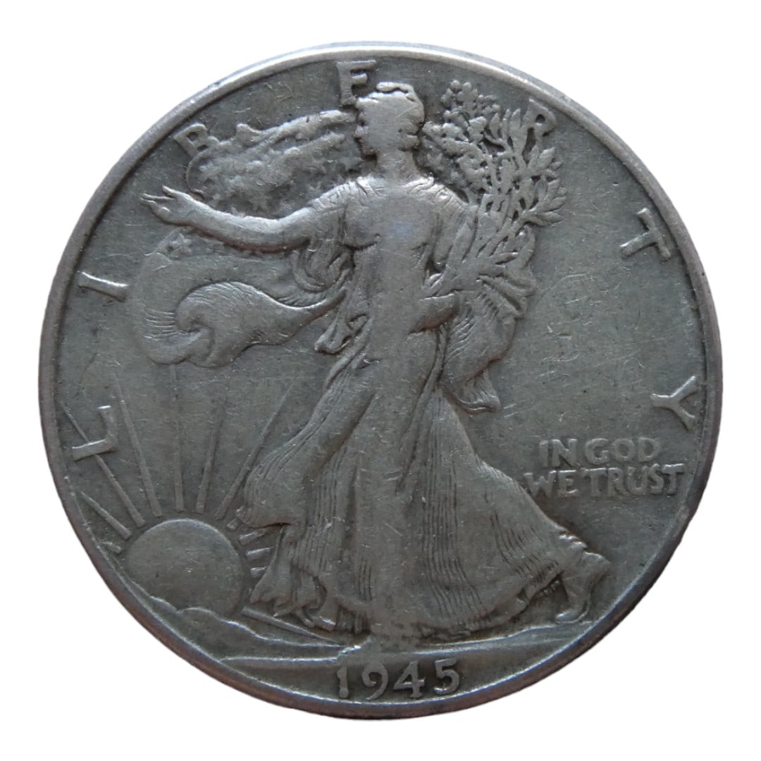 1945 U.S. Walking Liberty Half Dollar, Silver .900, Circulated: This 1945 Walking Liberty Half Dollar is a classic example of mid-20th-century American coinage, struck in 90% silver with a weight of 12.5 grams. Designed by Adolph A. Weinman and minted from 1916 to