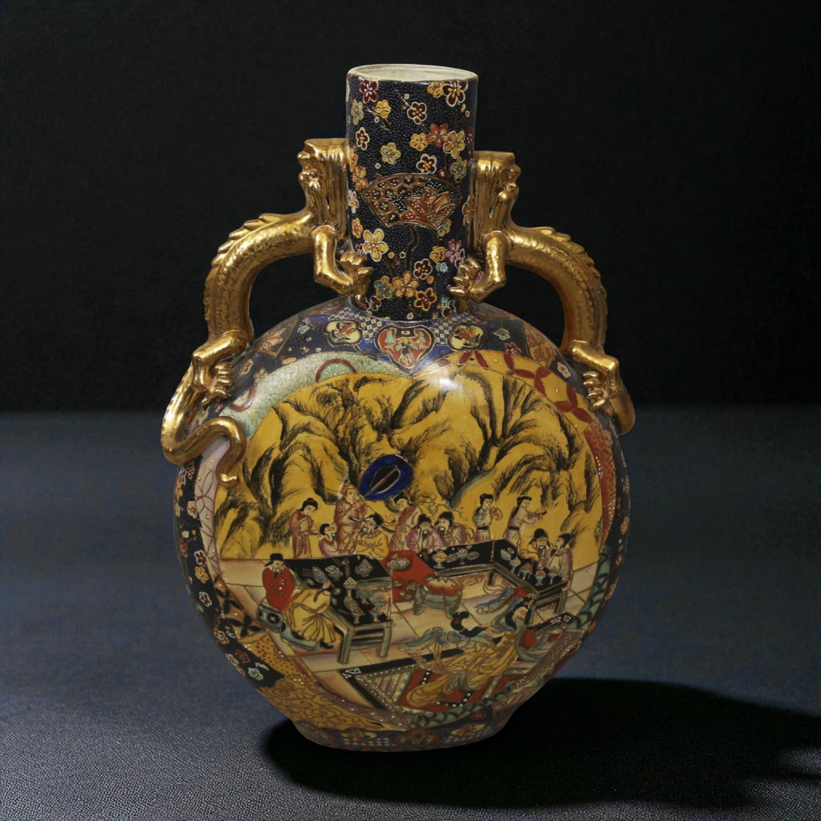 Monumental 20th Century Chinese Moonflask with Gilded Dragons and Polychrome Enamels: This grandiose moonflask, standing an impressive 76 cm tall and 50 cm wide, exemplifies the opulent revival of Qing-style decorative porcelain from the mid-to-late 20th century, executed with exceptio