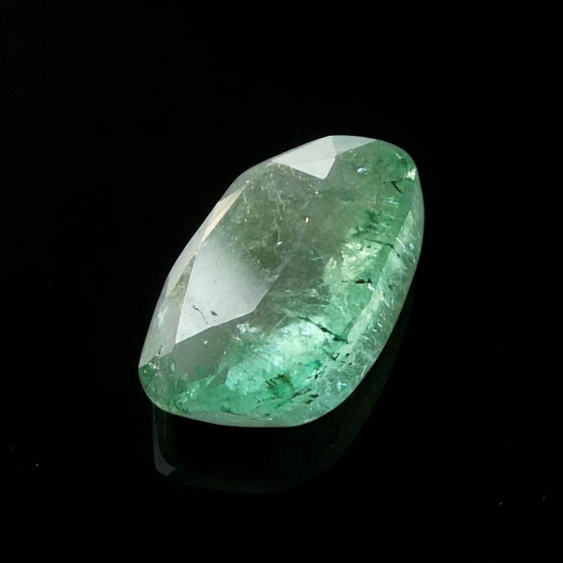 Natural Emerald 1.05 Carat Cushion Mixed Cut, IGI Certified, Pakistan Origin: A fine natural emerald of 1.05 carats, classified as Natural Beryl, Emerald variety, presented with an IGI (International Gemological Institute) Colored Stone Report (No. 5793545903, dated May 31, 202