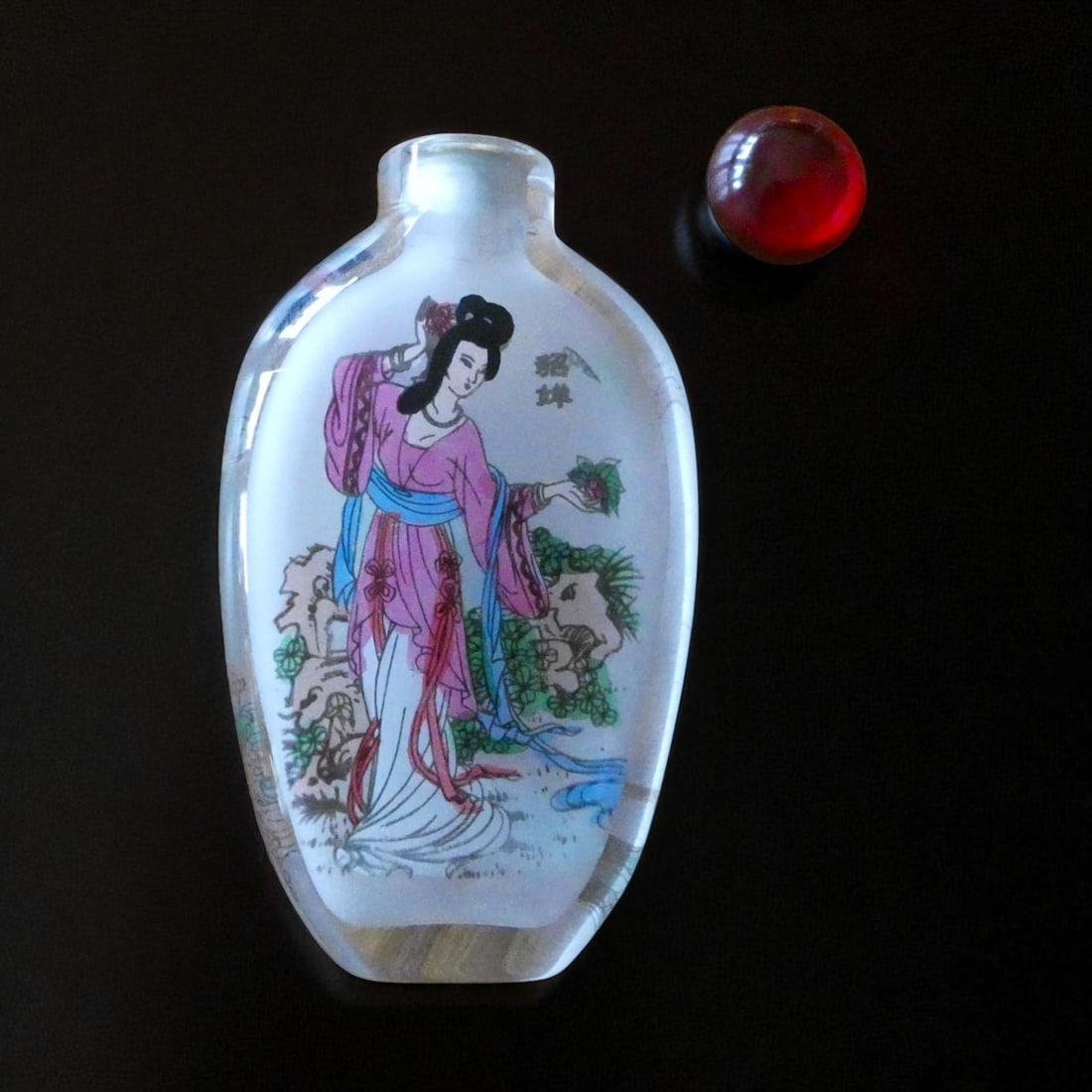Republic Period Porcelain Snuff Bottle with Floral Decoration and Jadeite Stopper: A delicately enameled porcelain snuff bottle from the Republic Period (circa 1912–1949), finely decorated in famille rose palette with a continuous floral motif of blooming pink cherry blossoms inte