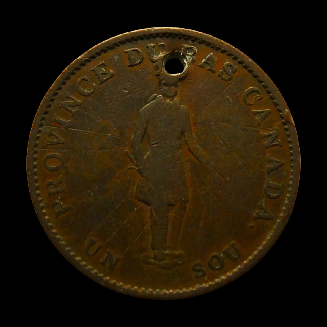 1837 Lower Canada Half Penny Token – Bank of Montreal Issue KM# Tn6: This 1837 Half Penny Token from Lower Canada, struck in copper, represents a significant chapter in Canadian pre-Confederation numismatics. Catalogued as KM# Tn6, it was issued during the period of th