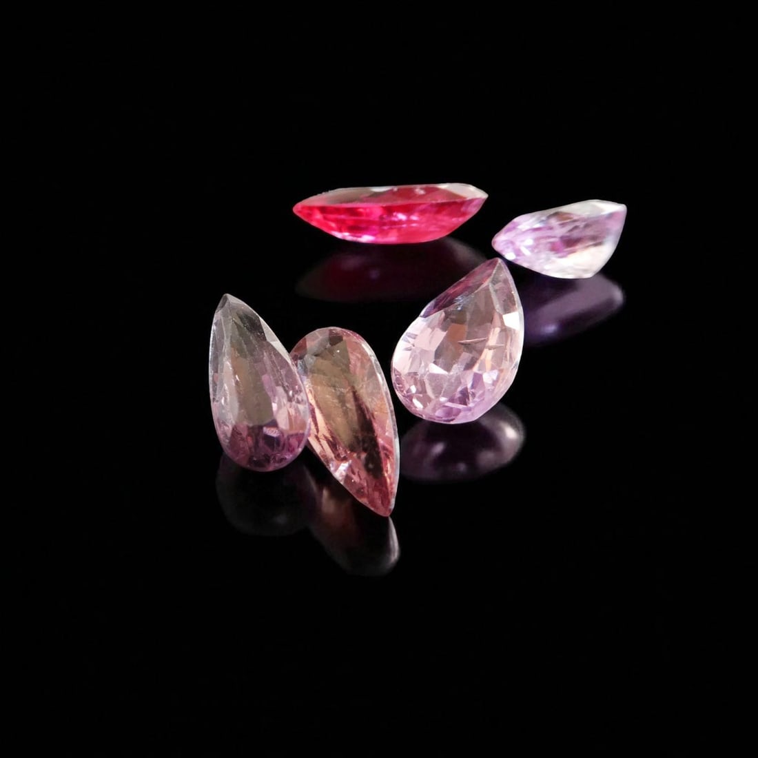 Group of 5 Pear-Cut Natural Spinels, Burma Origin, 2.80 ct Total: This elegant ensemble comprises five pear-cut natural spinels totaling 2.80 carats, originating from the legendary gemstone mines of Burma, renowned for producing some of the world's most vivid and pr