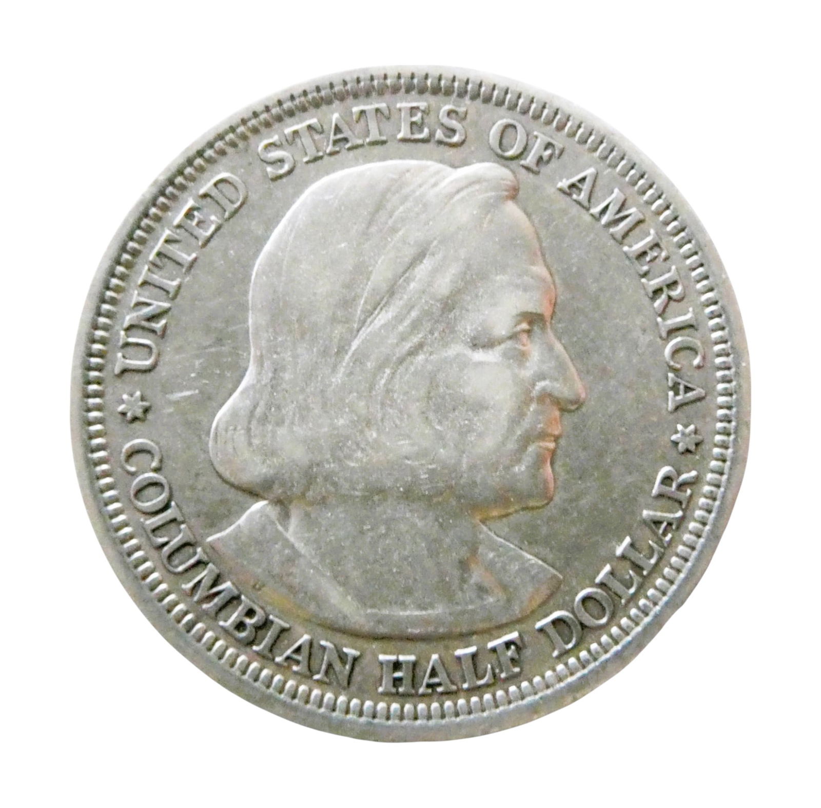 1893 United States Columbian Exposition Half Dollar KM 117 Silver: Historic United States commemorative silver half dollar issued in connection with the World’s Columbian Exposition held in Chicago in 1893. This coin represents the first commemorative coin ever str