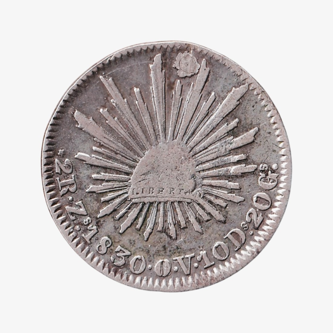 1830 Mexico 2 Reales Zs OV Silver Cap and Ray Coin: A classic early Republican Mexican silver coin, the 2 Reales of 1830 struck at the Zacatecas mint and bearing the assayer initials OV. Minted in .903 fine silver with a weight of approximately 5.9 gra