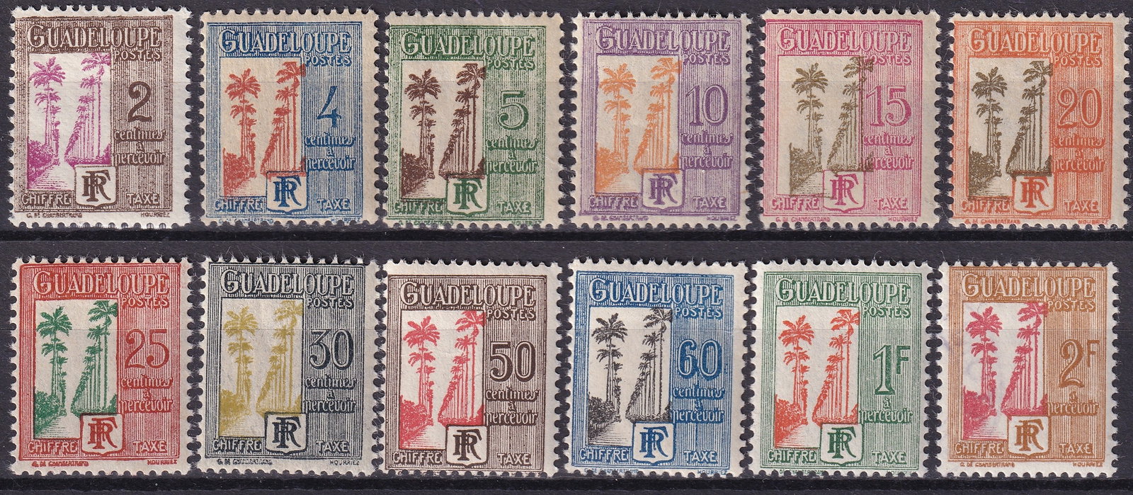 1928 French Guadeloupe Postage Due Set Scott J1 J12 Palm Tree Complete MNH: A complete mint never hinged set of postage due stamps issued for the French Caribbean colony of Guadeloupe around 1928, featuring the distinctive palm tree design typical of French colonial fiscal an