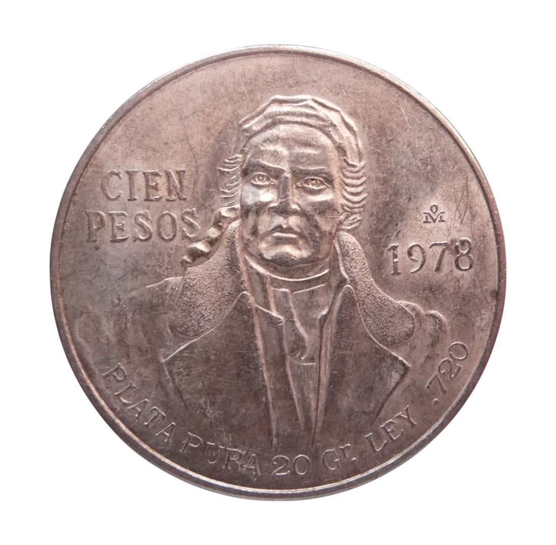 1978 Mexico 100 Pesos Silver Coin KM 483 Miguel Hidalgo: This 1978 Mexico 100 pesos silver coin is a significant numismatic issue struck by the Mexico City Mint during the late 20th century, embodying both historic symbolism and bullion value. The obverse p
