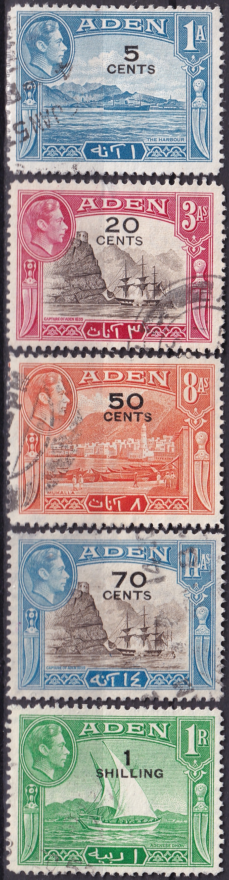 Aden 1951 King George VI Pictorials with New East African Currency Overprint (SG 36–42, Mi: Issued on October 1, 1951, this striking colonial series from Aden presents the final King George VI pictorial designs revalued to the East African currency system, featuring black surcharges in cents
