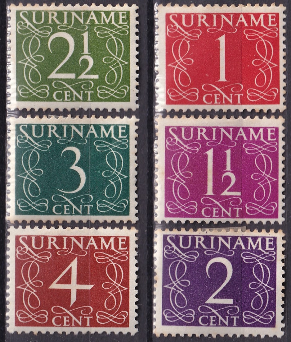 1948 Suriname Numeral Set Scott 211-216 MH VF Multi Values: A well-composed group of definitive numeral issues from Suriname, all originating from the 1948 series designed by the renowned Dutch typographer Jan van Krimpen. This selection includes multiple deno