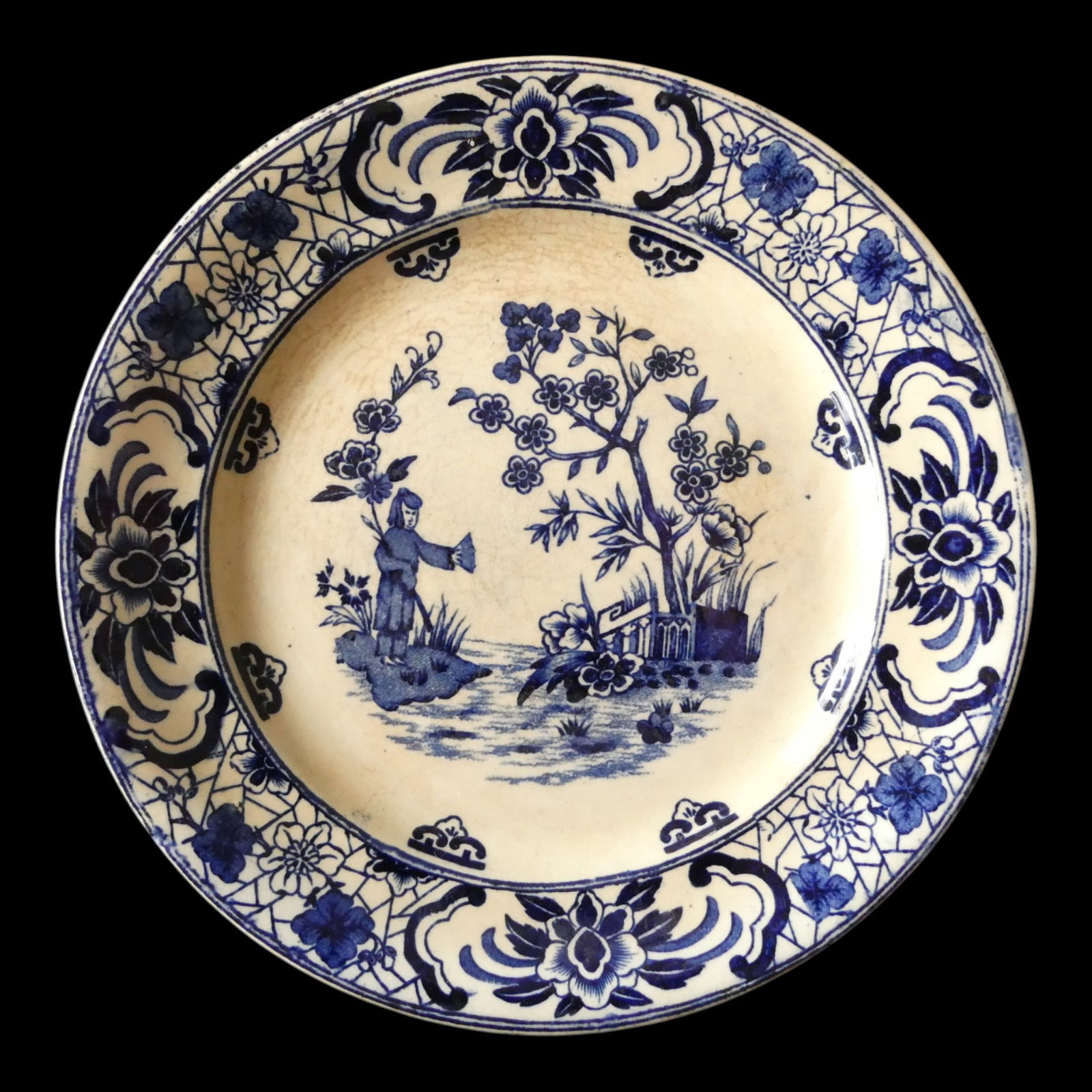 19th Century Rörstrand “Shanghai" Plate with Chinese-Inspired Blue Decor: This 19th-century plate, produced by Rörstrand and marked “Shanghai,” is a fine example of the fascination with Chinese export porcelain that swept through Europe during the late 1800s. Execu