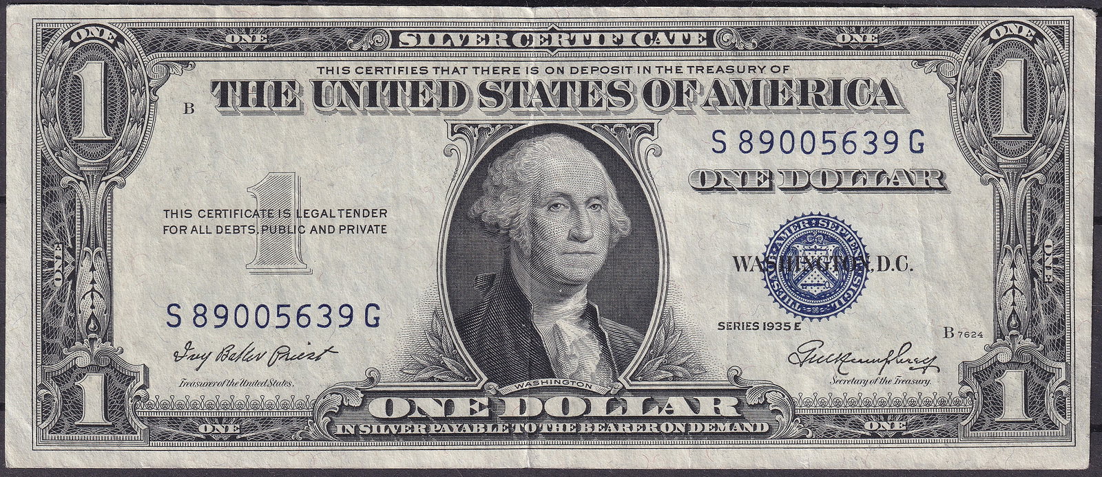 1935E United States One Dollar Silver Certificate Fr.1614 VF: Historic United States One Dollar Silver Certificate from the popular Series 1935E issue, bearing serial number S89005639G. Silver Certificates were issued by the United States Treasury between 1878 a