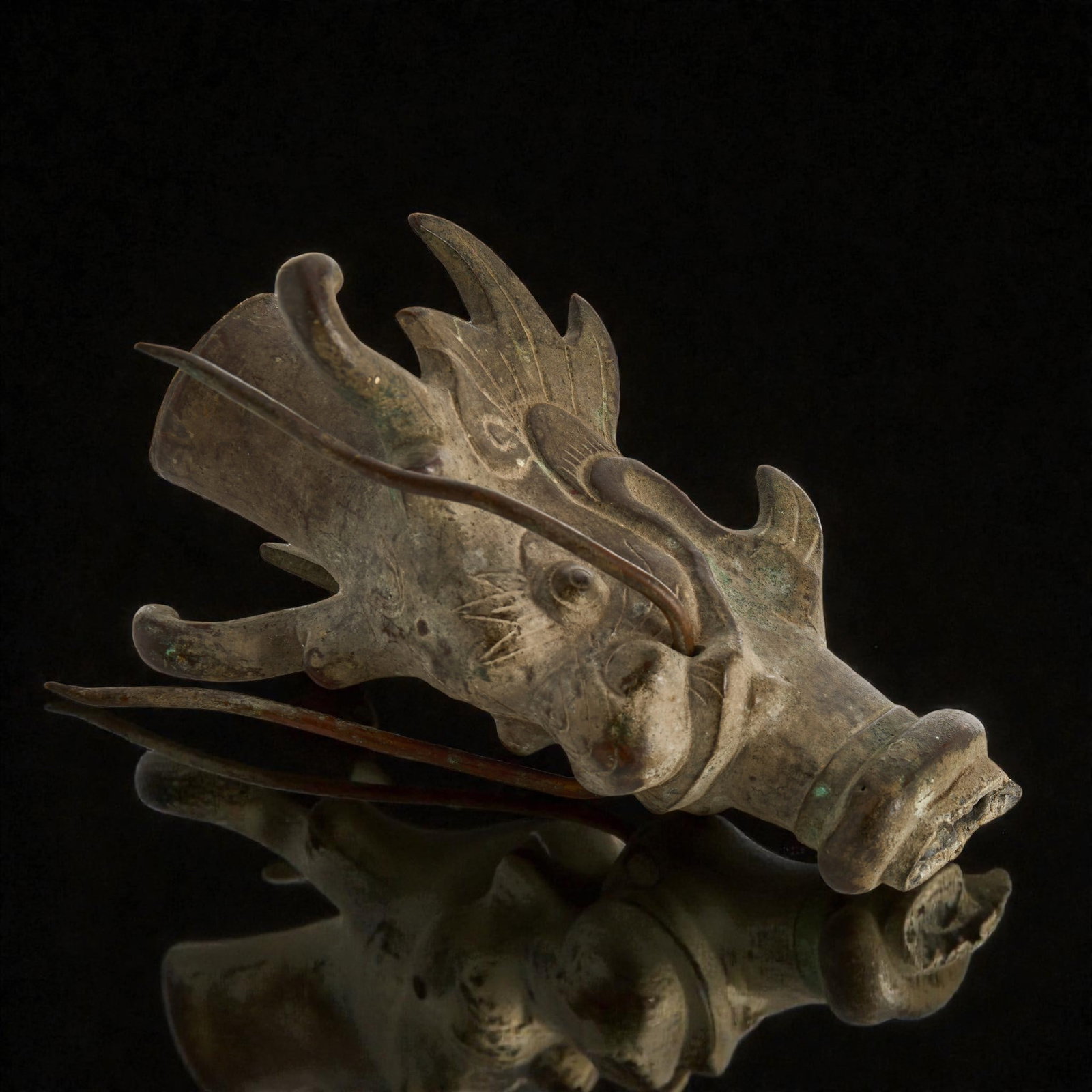 Qing Dynasty China Bronze Dragon Head Lance Fitting 18th Century: This eighteenth-century bronze dragon head lance fitting from China is a finely cast example of Qing dynasty martial metalwork, combining symbolic imagery with functional craftsmanship. Measuring appr