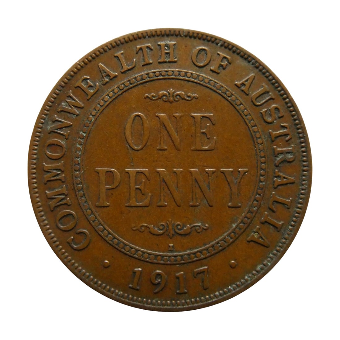 Australia 1917 George V One Penny Bronze Coin KM#23: Struck in 1917 during the reign of King George V, this bronze One Penny belongs to the first unified coinage of the Commonwealth of Australia, issued from 1911 to 1936. Catalogued as KM#23, the coin w