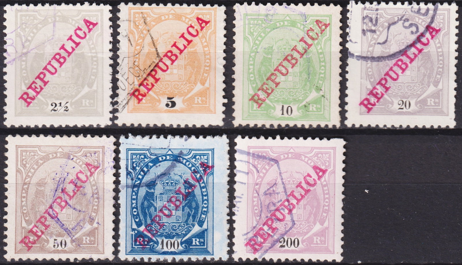 Portuguese Scott 125-131 Mozambique Company 1911 Republica Overprints, Used: Issued in 1911 by the Mozambique Company, this remarkable group of seven definitive stamps features the Arms of Mozambique Company overprinted diagonally in bold red with the word "REPUBLICA," marking
