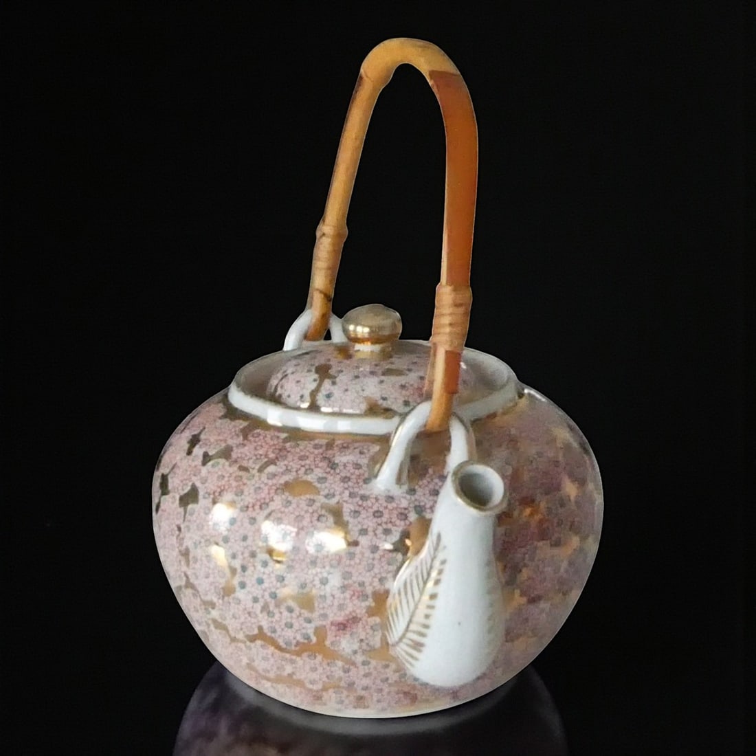 1950 Japan Showa Period Satsuma Style Teapot Signed: This finely decorated Japanese porcelain teapot dates to the Showa period circa 1930-1950 and is executed in the traditional Satsuma style intended for the export market. The globular body is richly c