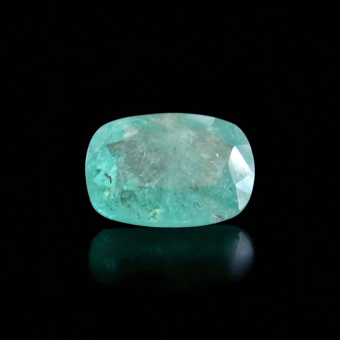 Certified 3.18 ct Cushion-Cut Emerald, IGI Reported, Swat Origin: A richly colored, cushion-cut emerald of 3.18 carats displaying a vivid green hue and natural crystalline inclusions, this gemstone exemplifies the growing international appreciation for emeralds of P